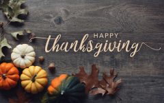 Happy Thanksgiving greeting text with colorful pumpkins, squash
